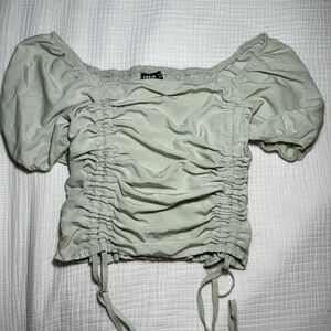 light green ruffle top